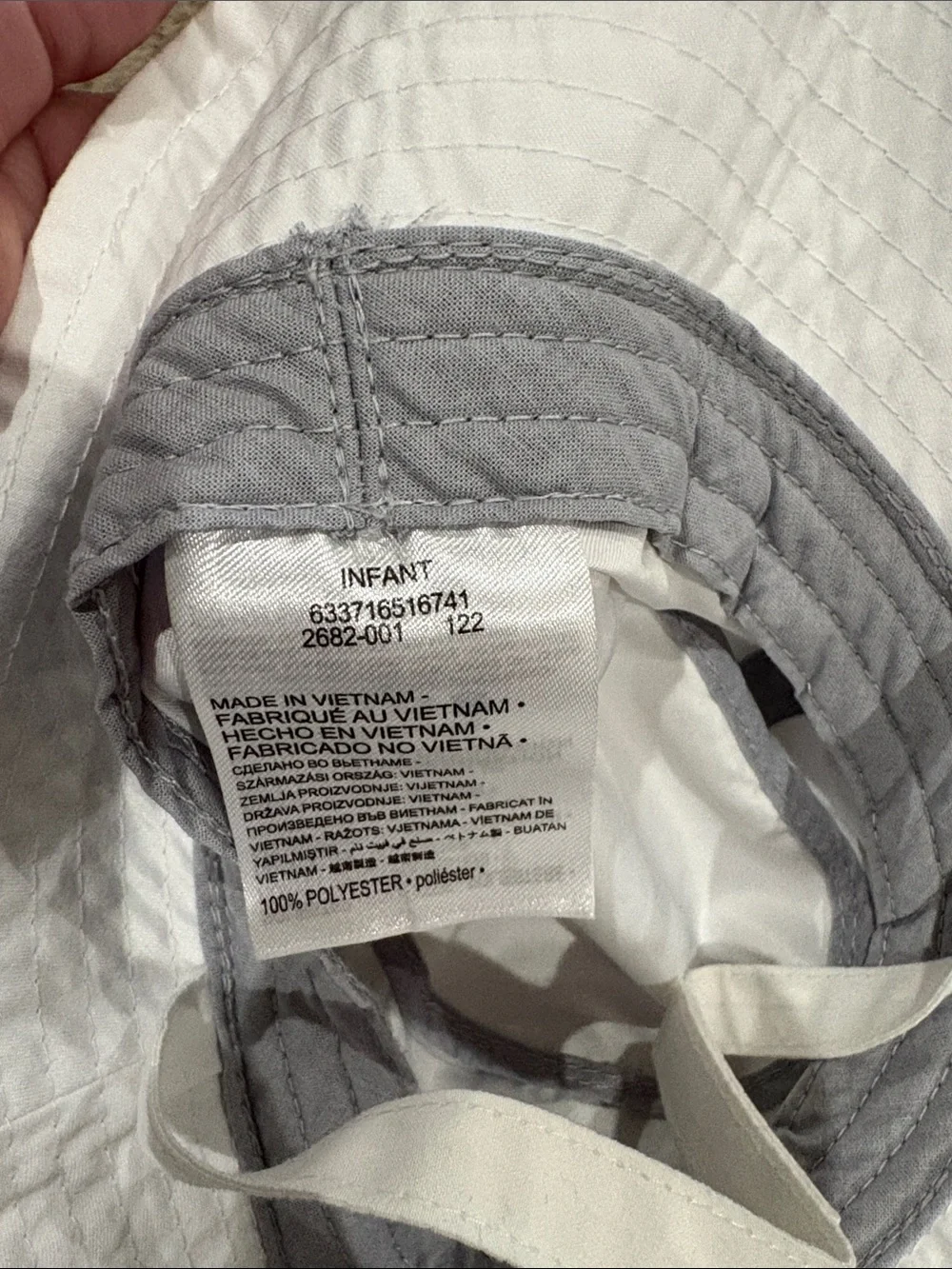 Nike White Bucket Hat with Black Swoosh Logo
